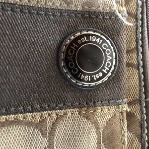 Coach, brown canvas wristlet